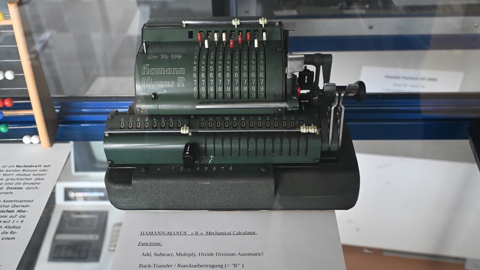 An antique mechanical calculating machine, standing in for the arithmetic this post asks you to redo with your own salary and hour figures
